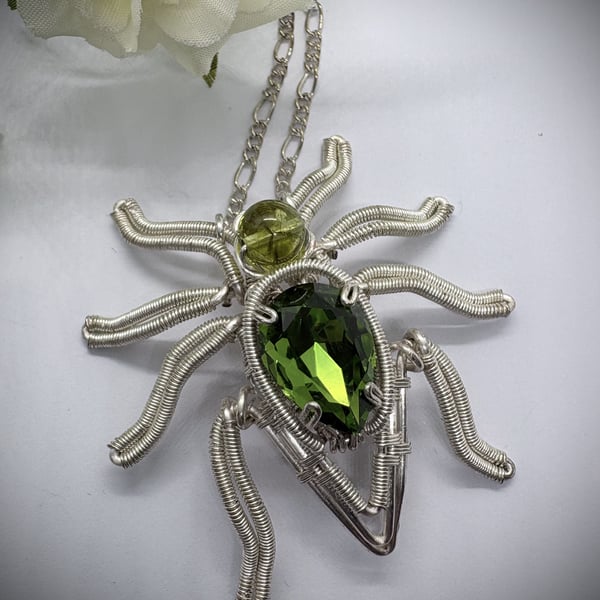 Silver wire wrapped Spider with Peridot and crystal details