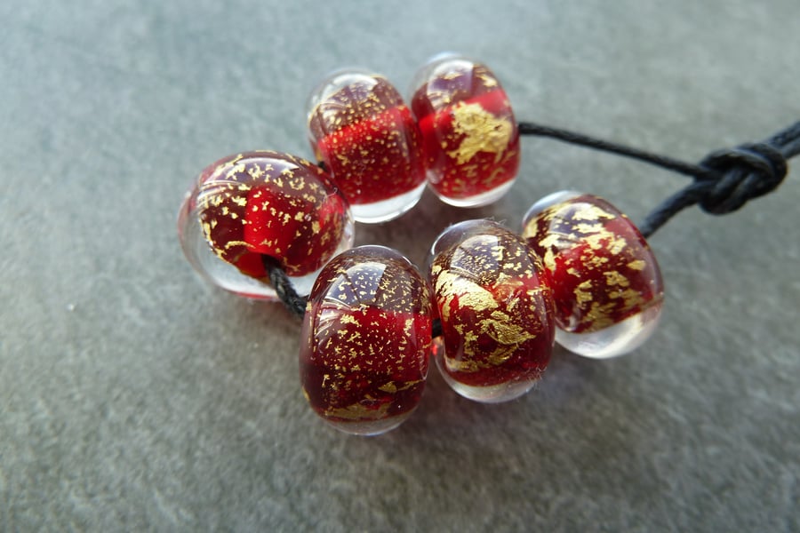 red and gold leaf lampwork glass beads