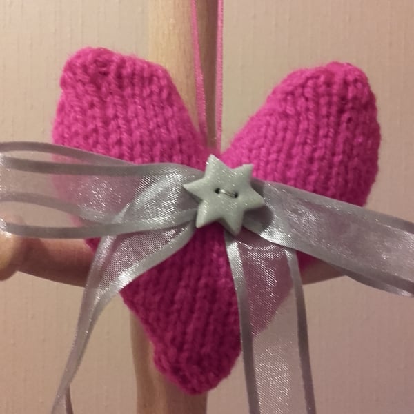 hand knitted pink heart with silver bow and star, pink heart with bow