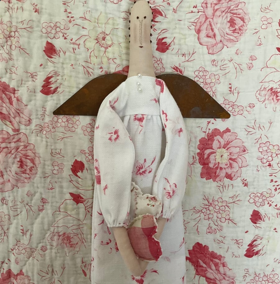 Primitive Angel with hearts