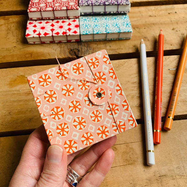 Mini Hand Bound Mixed Media Sketchbook with Button Closure. Orange and Cream.