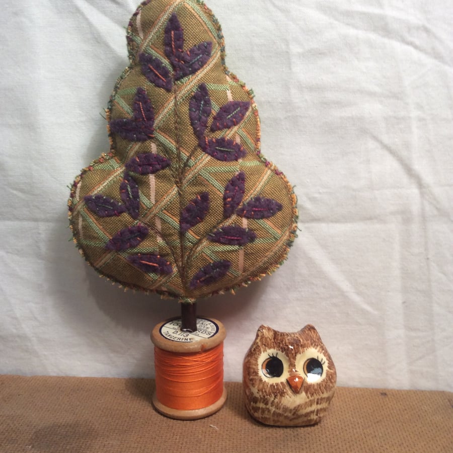 Cotton reel tree - golden upholstery fabric with purple leaves