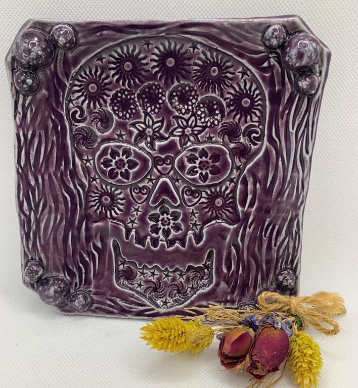 Textured Square trinket dish decorated with a skull.