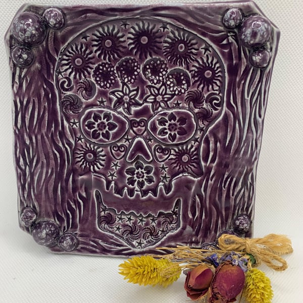 Textured Square trinket dish decorated with a skull.