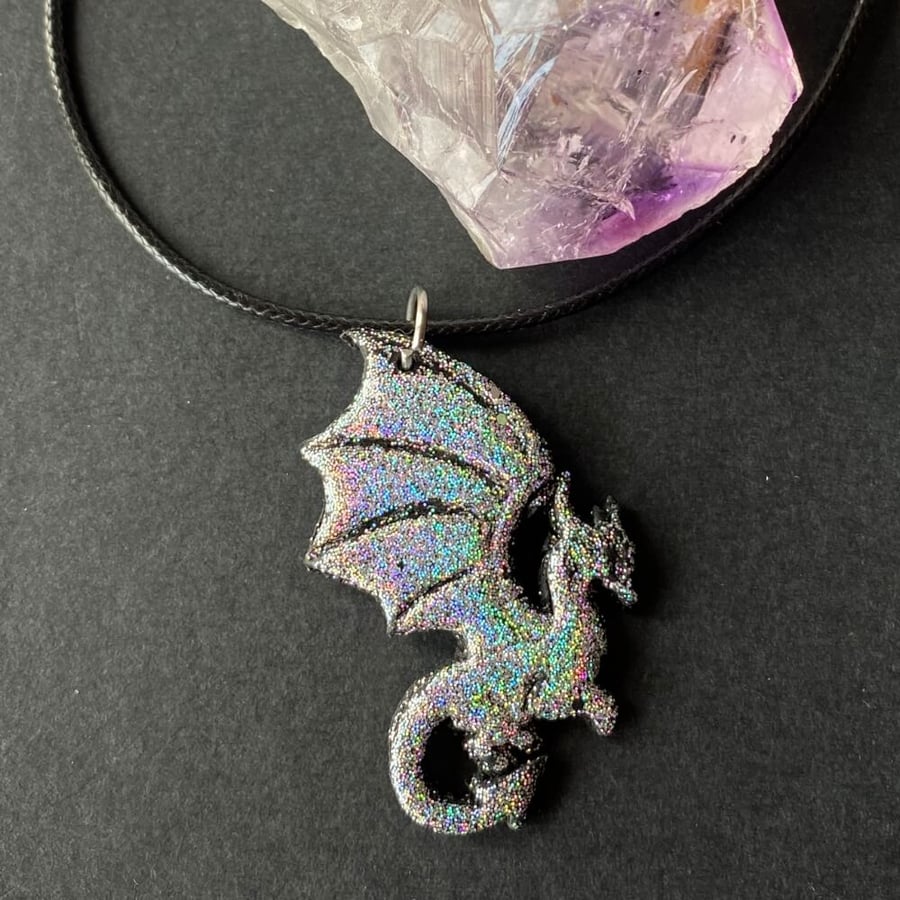 Silver glitter dragon necklace handmade with black polymer clay.