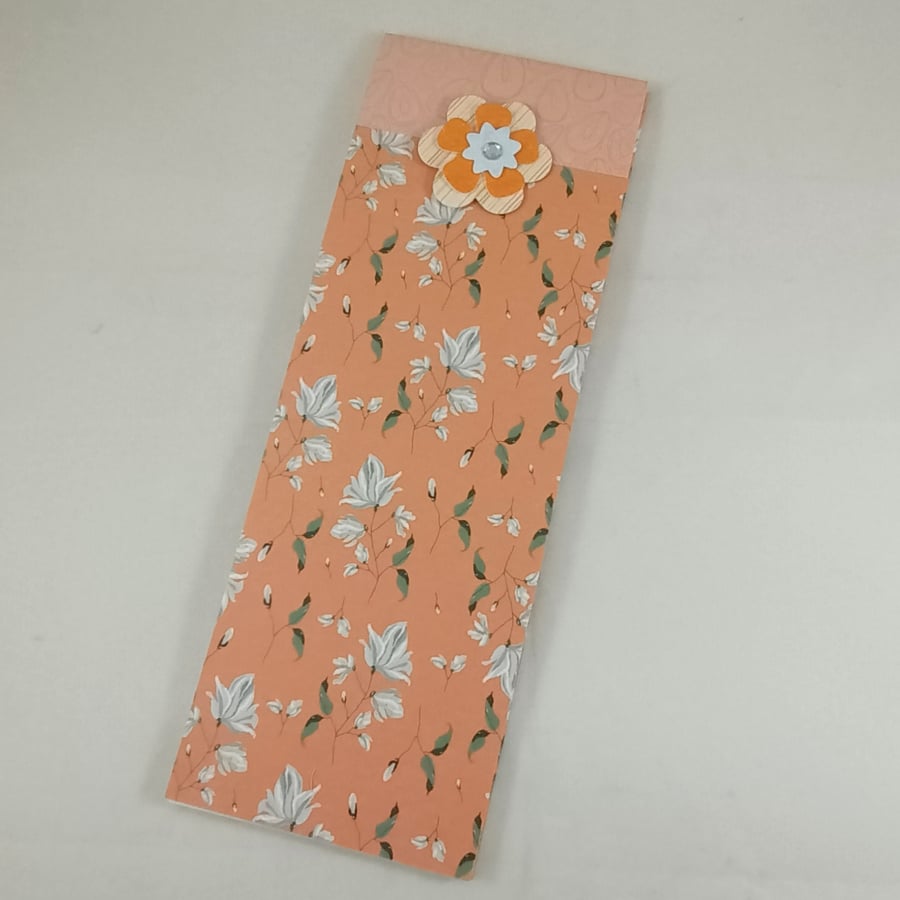Orange floral lined notepad