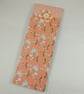 Orange floral lined notepad - Image 1