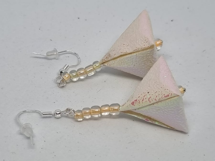 Pyramid-shaped origami earrings:  pale pink iridescent paper and small beads 