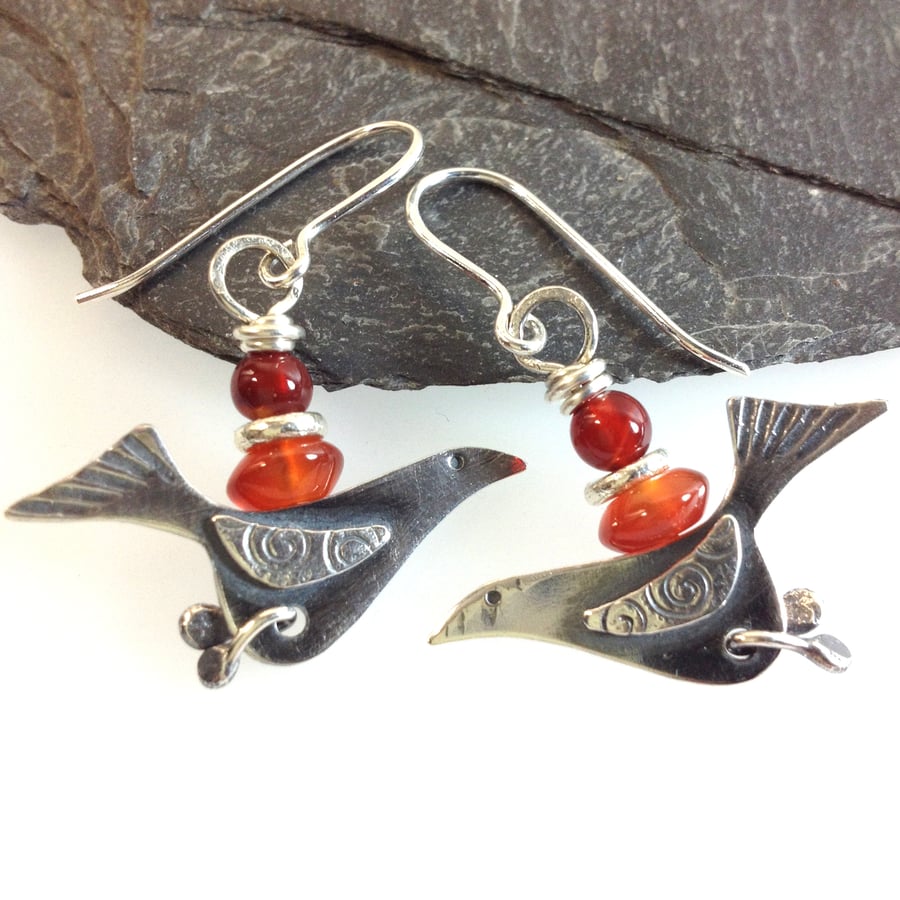 silver bird earrings with juicy orange carnelian.