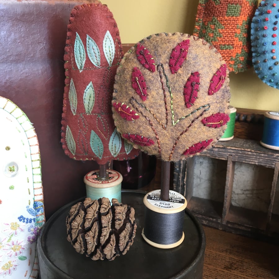 Pair of cotton reel trees