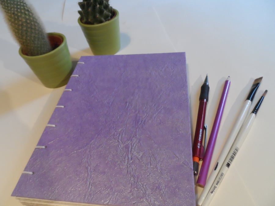 Hand made book with Coptic stitch binding and mixed papers (no 20)