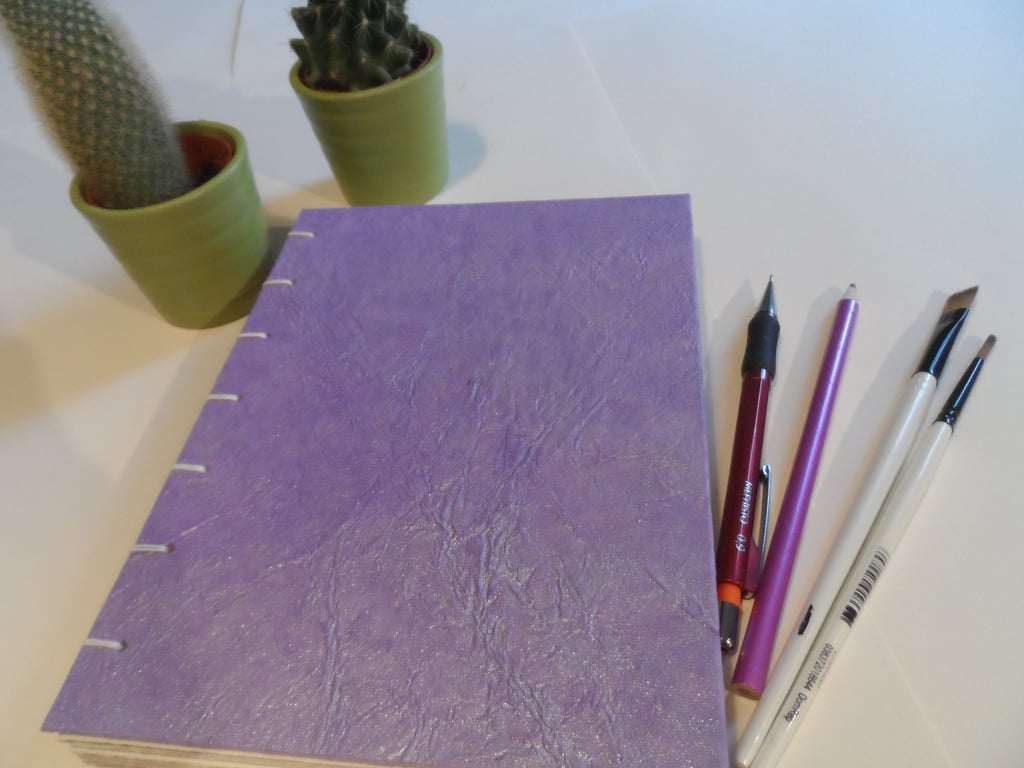 Hand made book with Coptic stitch binding and mixed papers (no 20)