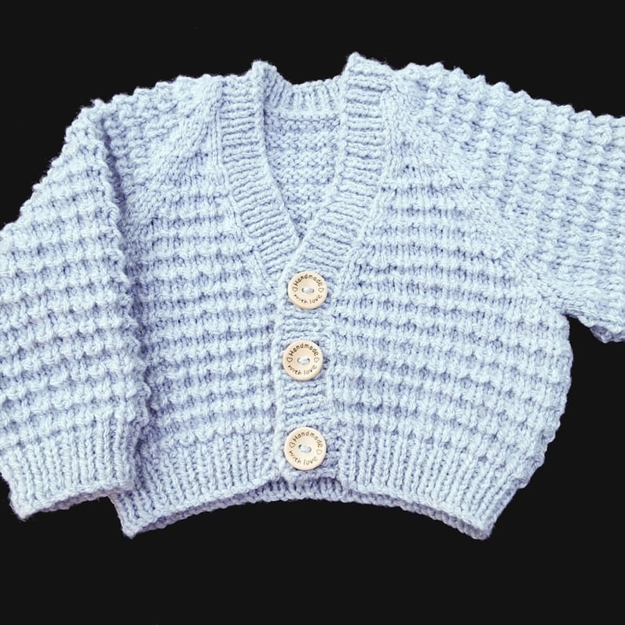 Hand knitted baby cardigan in light grey textured pattern Seconds Sunday