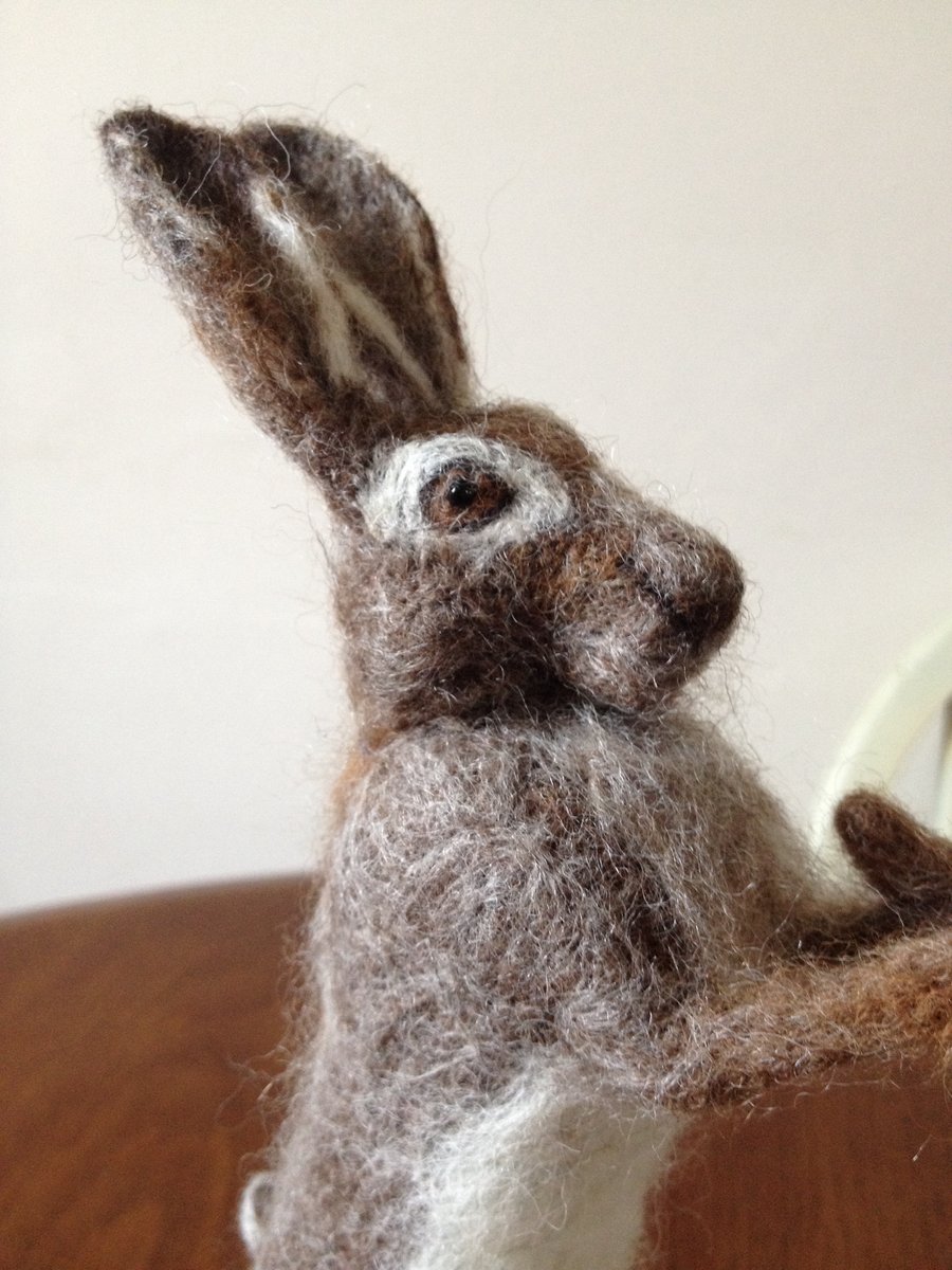 Boxing hares in needle felt