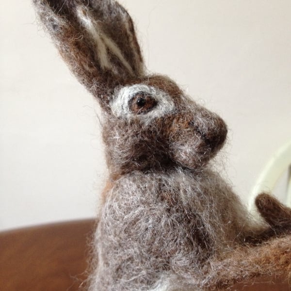 Boxing hares in needle felt