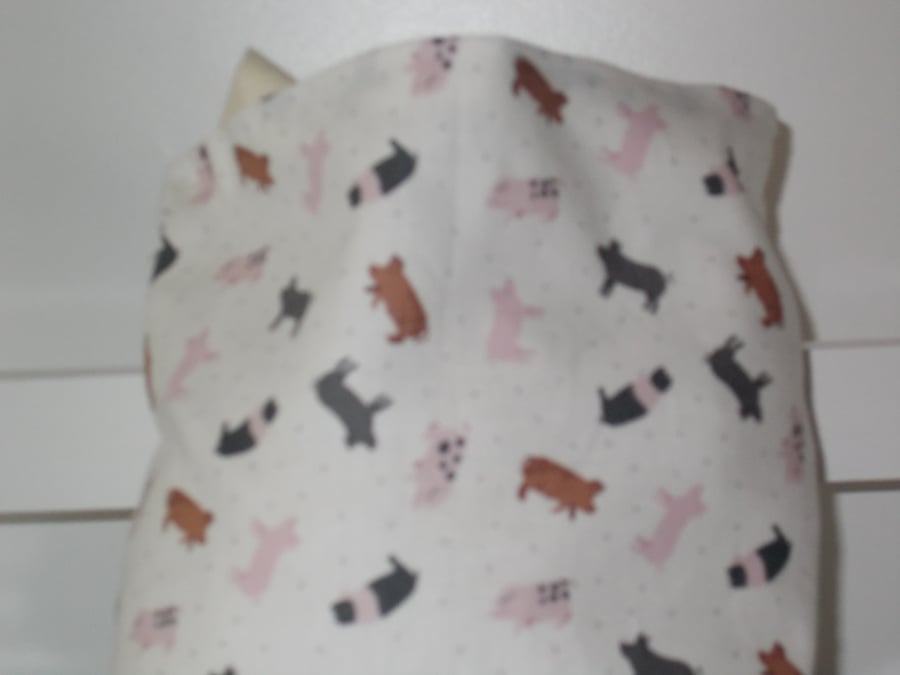 Mini drawstring bag with a pig print