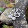 Silver star drop earrings