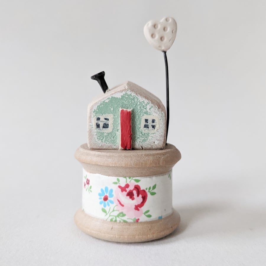 Wooden House on a Vintage Bobbin with Clay Heart