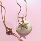 Ocean jewellery - Natural shell trimmed with gold colour pendant on necklace