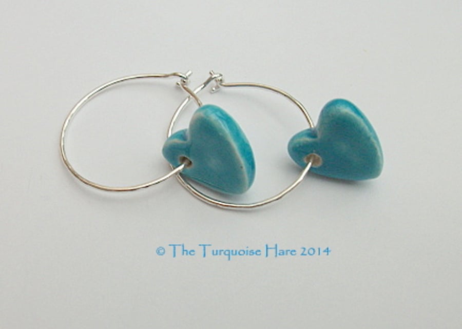 Ceramic turquoise heart earrings on sterling silver hammered hoops