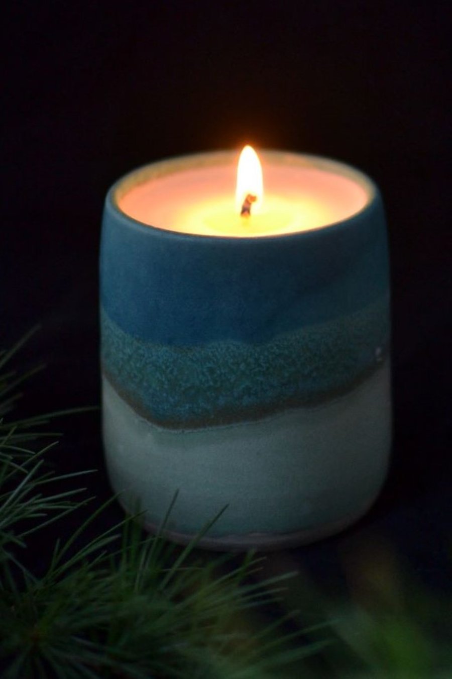 Ceramic candle holder with a hand poured scented candle 