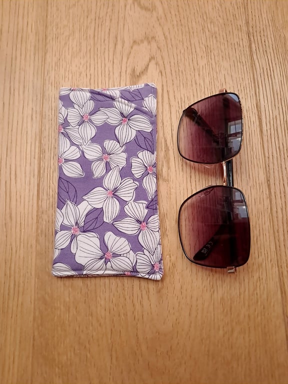 Purple padded glasses case with white flowers