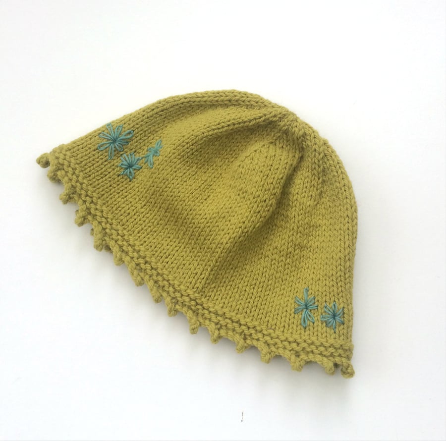 Hand knitted green wool hat