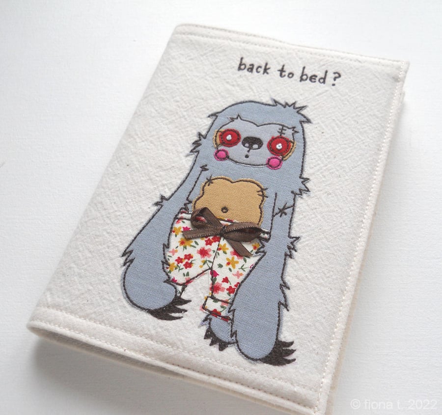 freehand embroidered zombie sloth in pyjamas notebook sketchbook mustard yellow