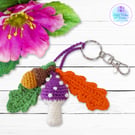 Purple toadstool, acorn and oak leaves crochet bag charm. Toadstool keyring
