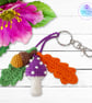 Purple toadstool, acorn and oak leaves crochet bag charm. Toadstool keyring
