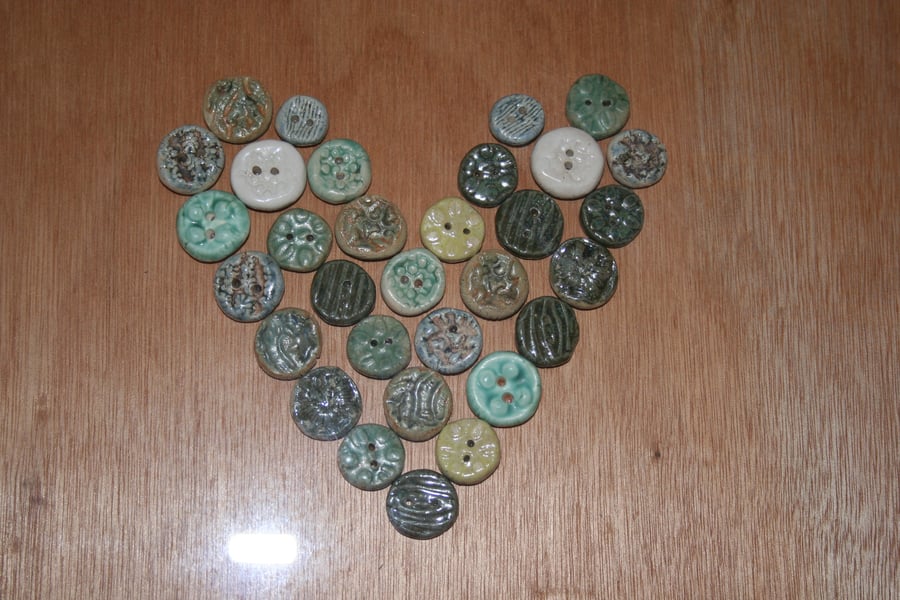 Framed ceramic button heart design 