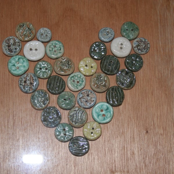 Framed ceramic button heart design 