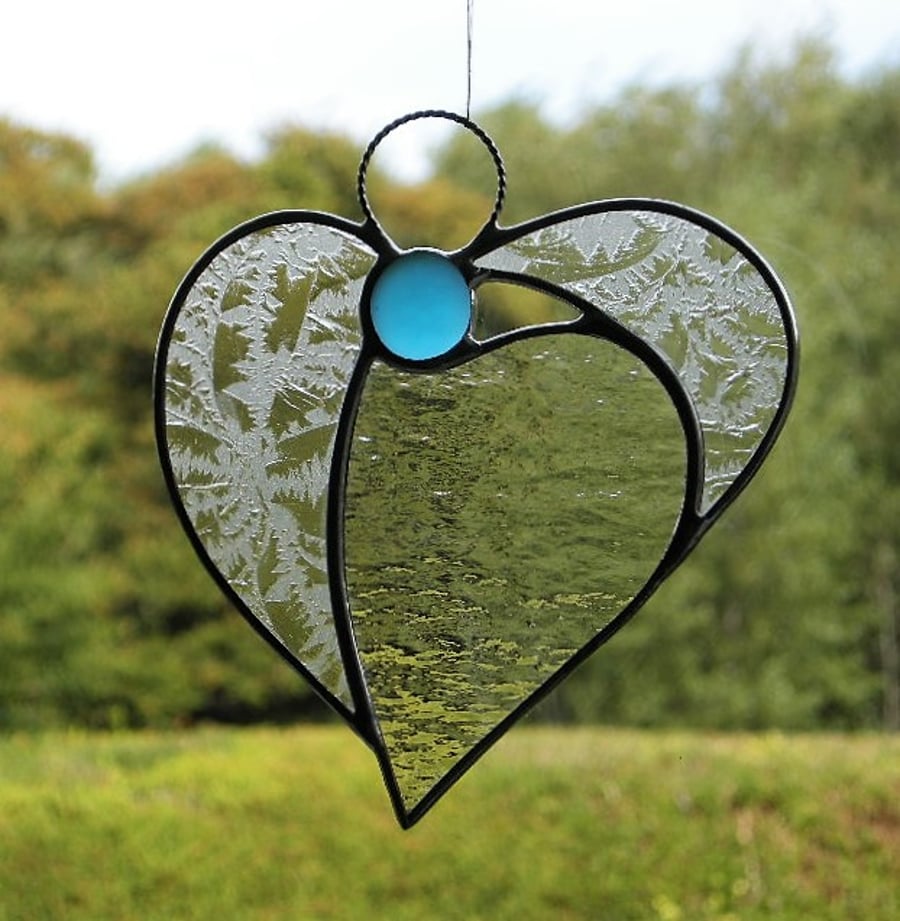 Stained glass (Angel Heart) in two different textured clear glass