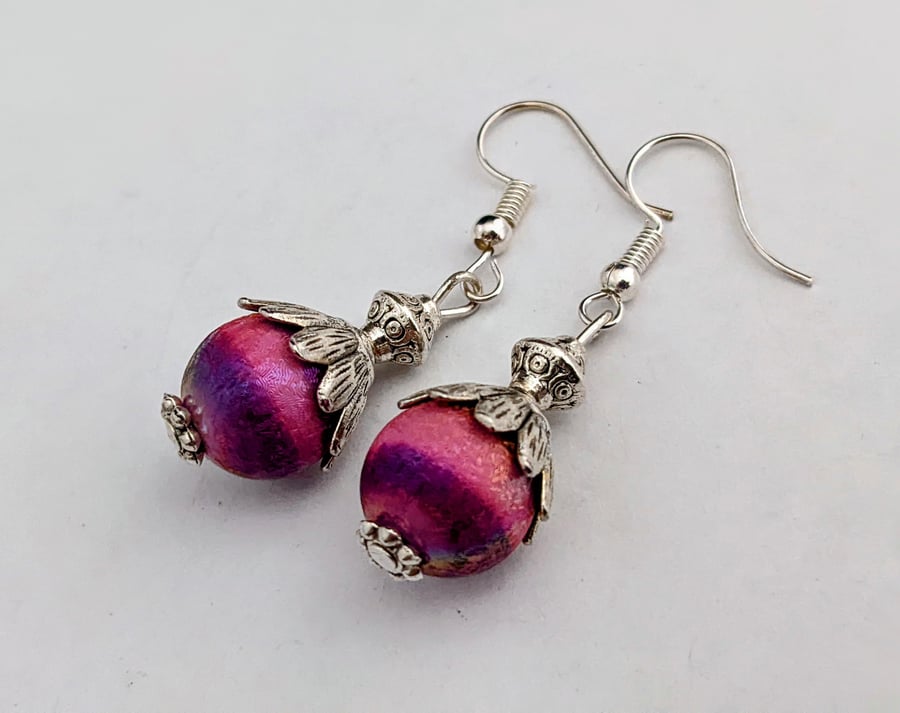 Shimmery purple and pink stripe glass earrings