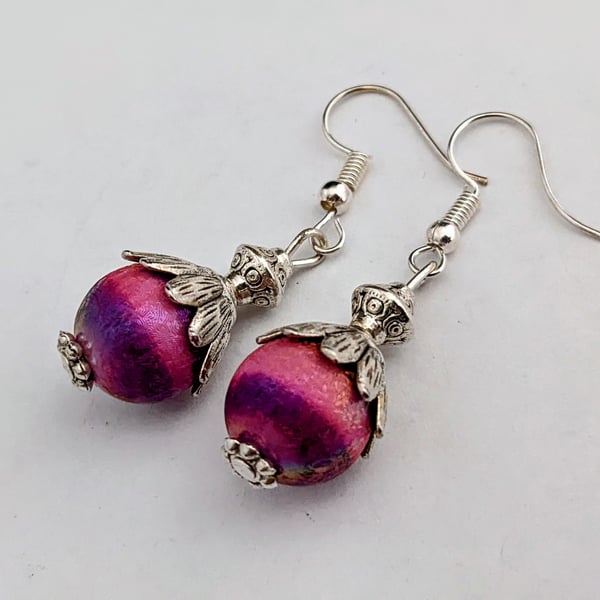 Shimmery purple and pink stripe glass earrings