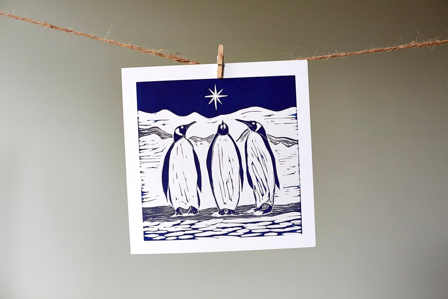 'We Three Penguins' dark blue Christmas card