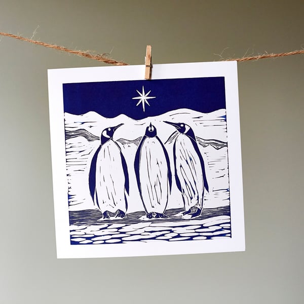 'We Three Penguins' dark blue Christmas card