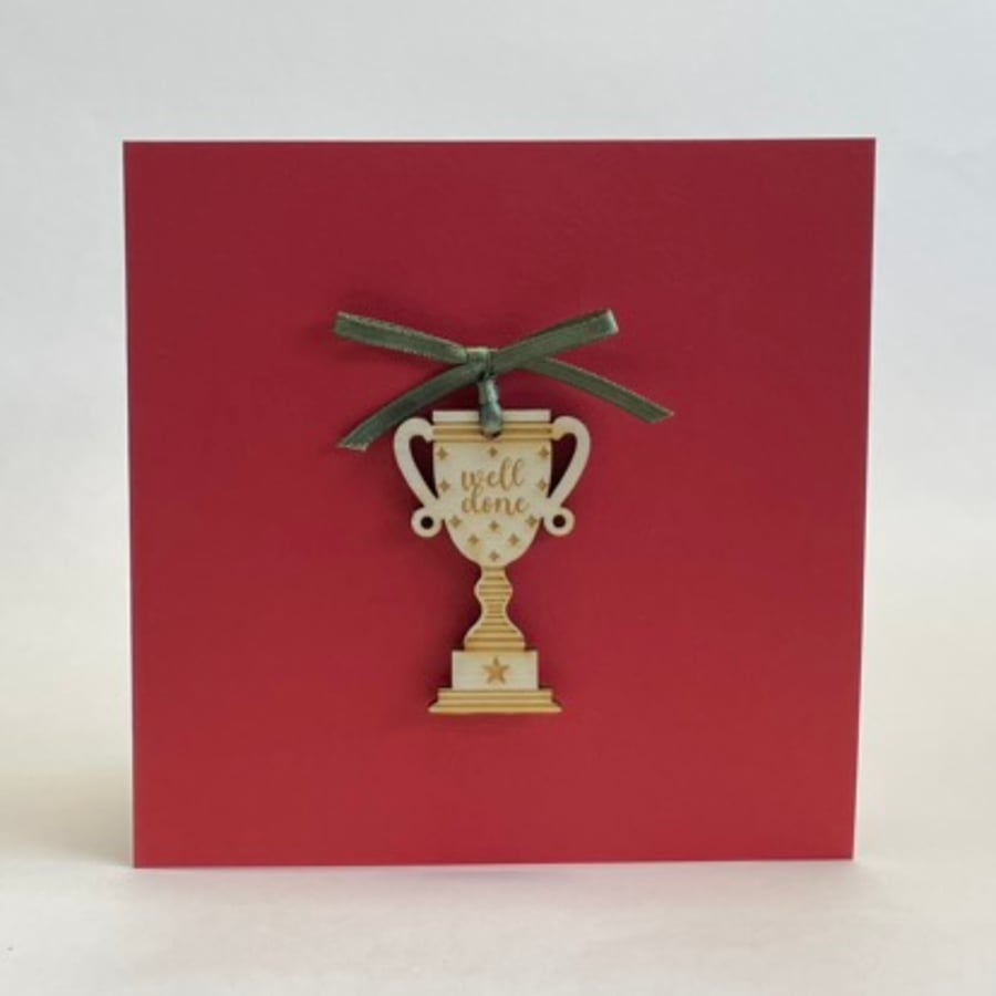 'Well done' trophy card with detachable decoration
