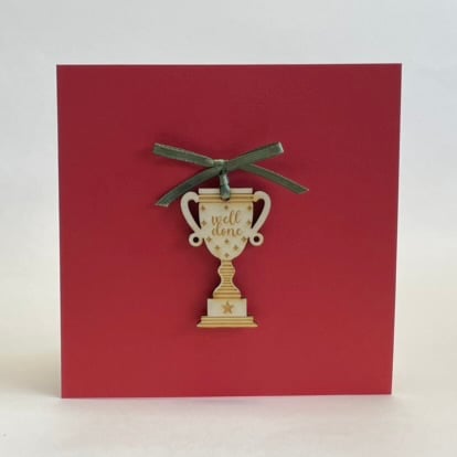 'Well done' trophy card with detachable decoration