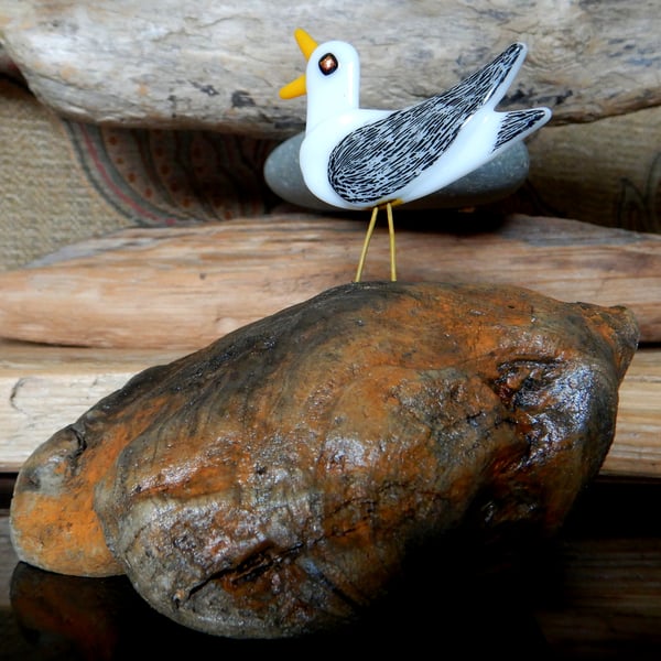 Handmade Fused Glass 'Seagull on Driftwood' ornament.