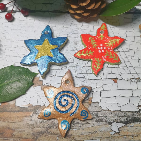 Hand painted Clay Snowflakes.