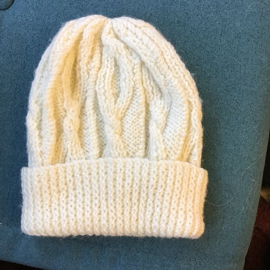 Hand knitted Aran style cable hat in cream for 4-7 years
