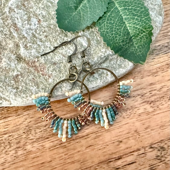 Small bohemian beadwork hoop fringe earrings in blue and bronze