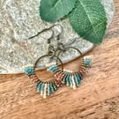 Bohemian beadwork hoop fringe earrings in blue and bronze