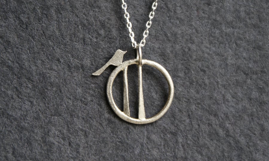 Tiny edge of the woods bird necklace