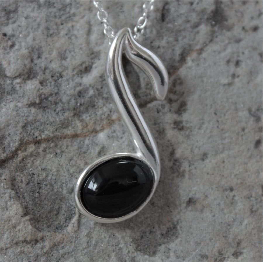 Musical Note Sterling Silver Pendant.