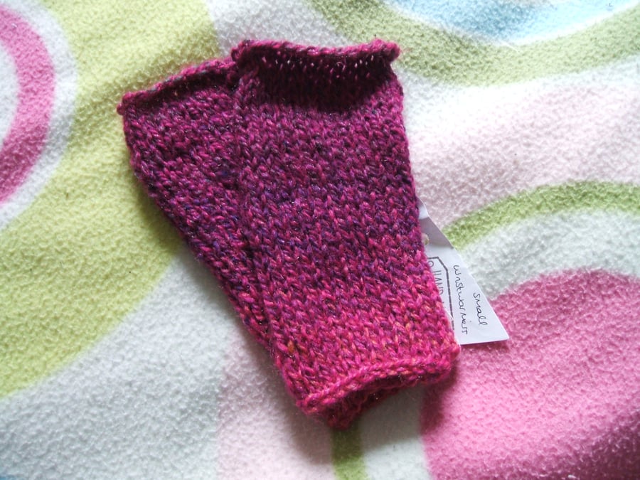 Bright variegated pink hand knitted wrist warmers - children's size