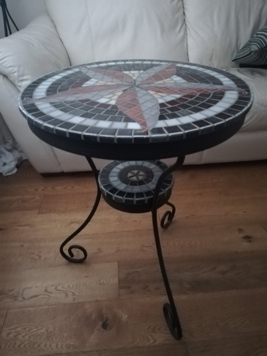 Mosaic Table Toppers on a black metal table frame
