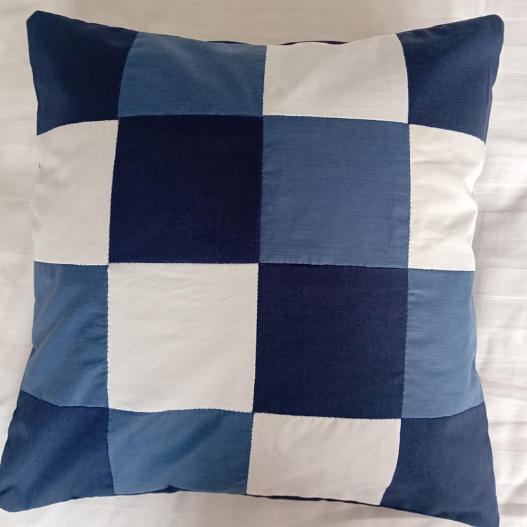 Patchwork cushion cover. Navy blue, mid blue and white cushion cover