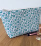 Make up bag, small toiletry bag, water resistant lining, in cream and blue - Image 1
